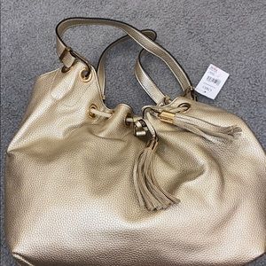 GOLD PURSE WITH TAGS